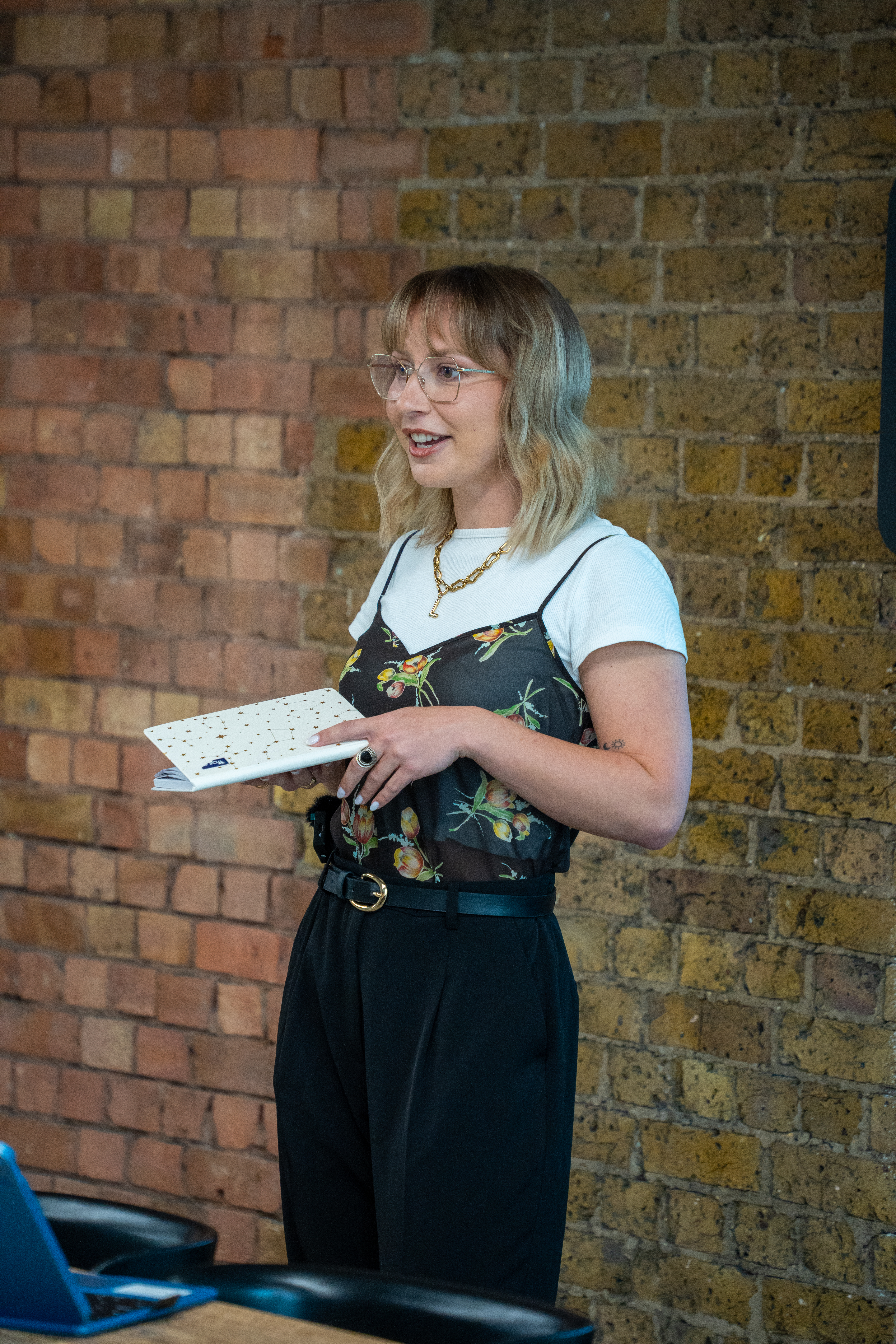 Lucy Twilley of Clear About Periods delivering menstrual health and period awareness training to a workplace team